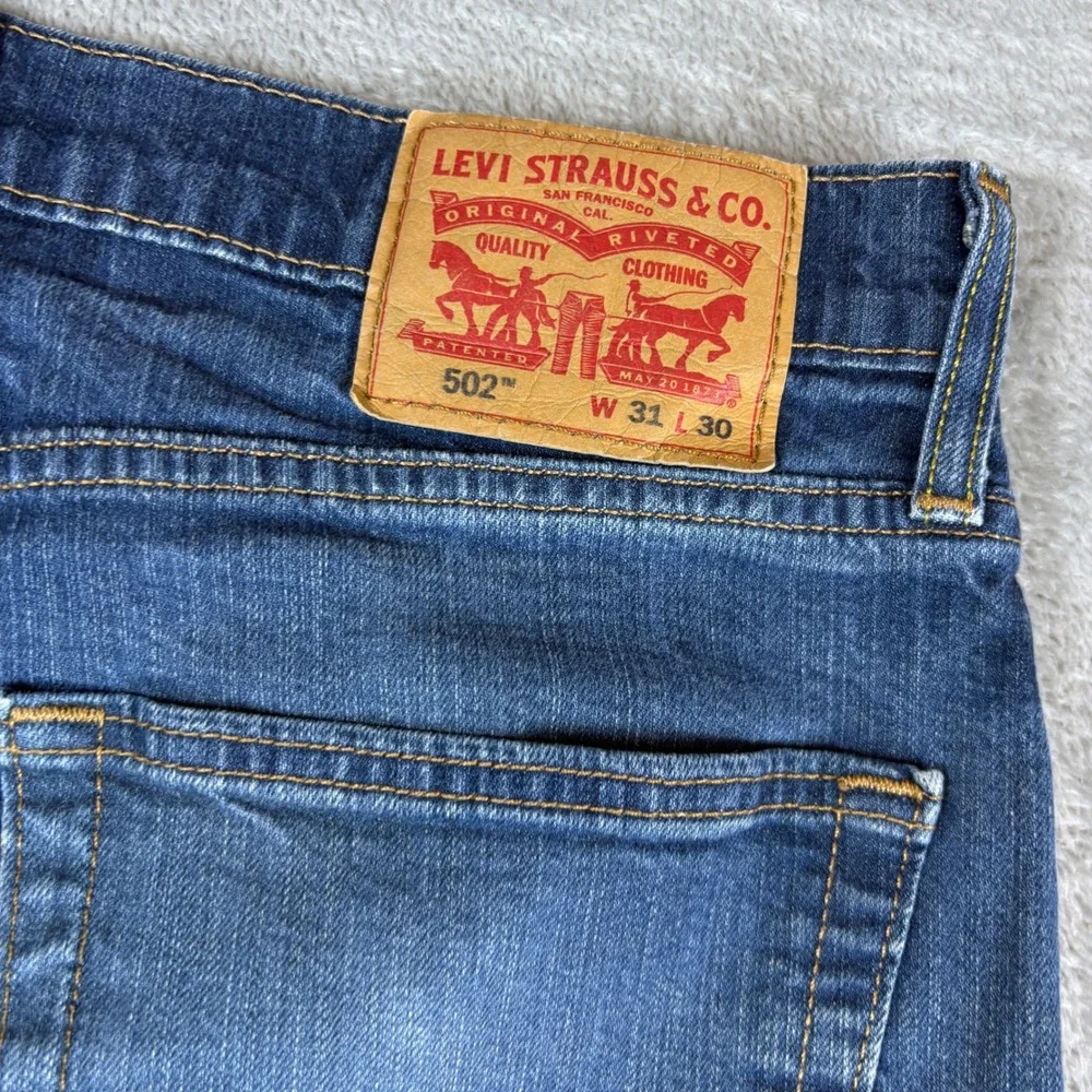 Levi's Jeans Men 31x30 (Fits 32x28) 502 Taper Whisker Faded Blue Regular Stretch